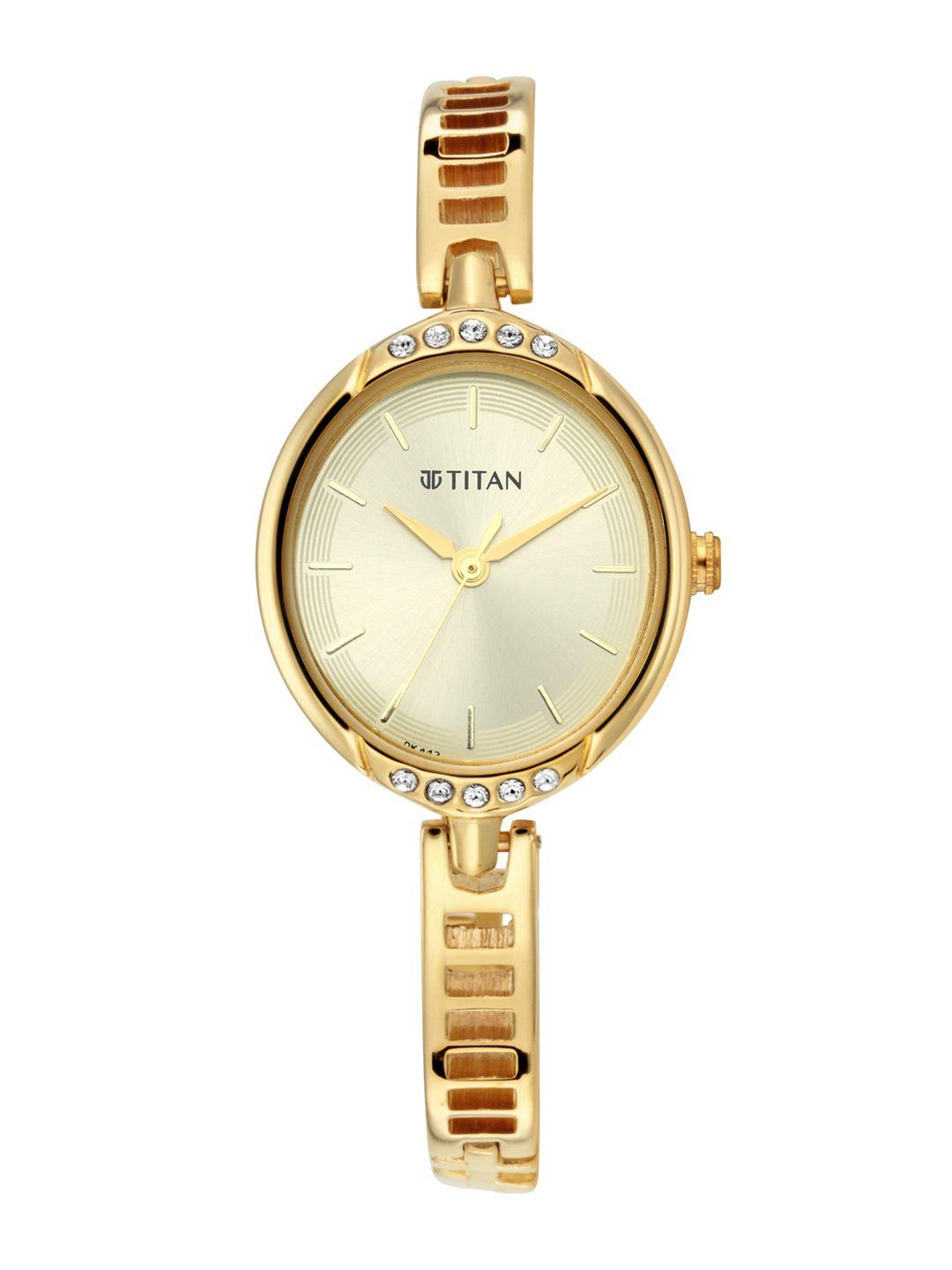 titan women gold-toned analogue watch