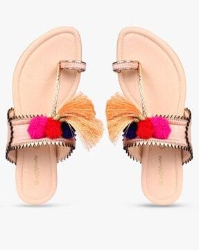 toe-ring flat sandals with pom-pom