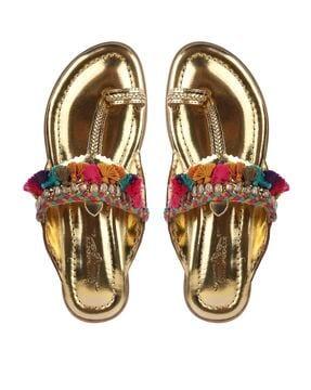 toe-ring sandals with tassels