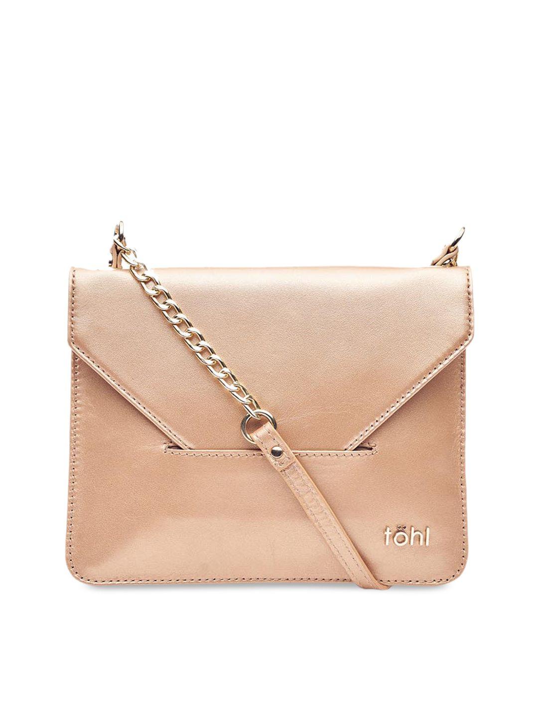 tohl rose gold solid leather sling bag