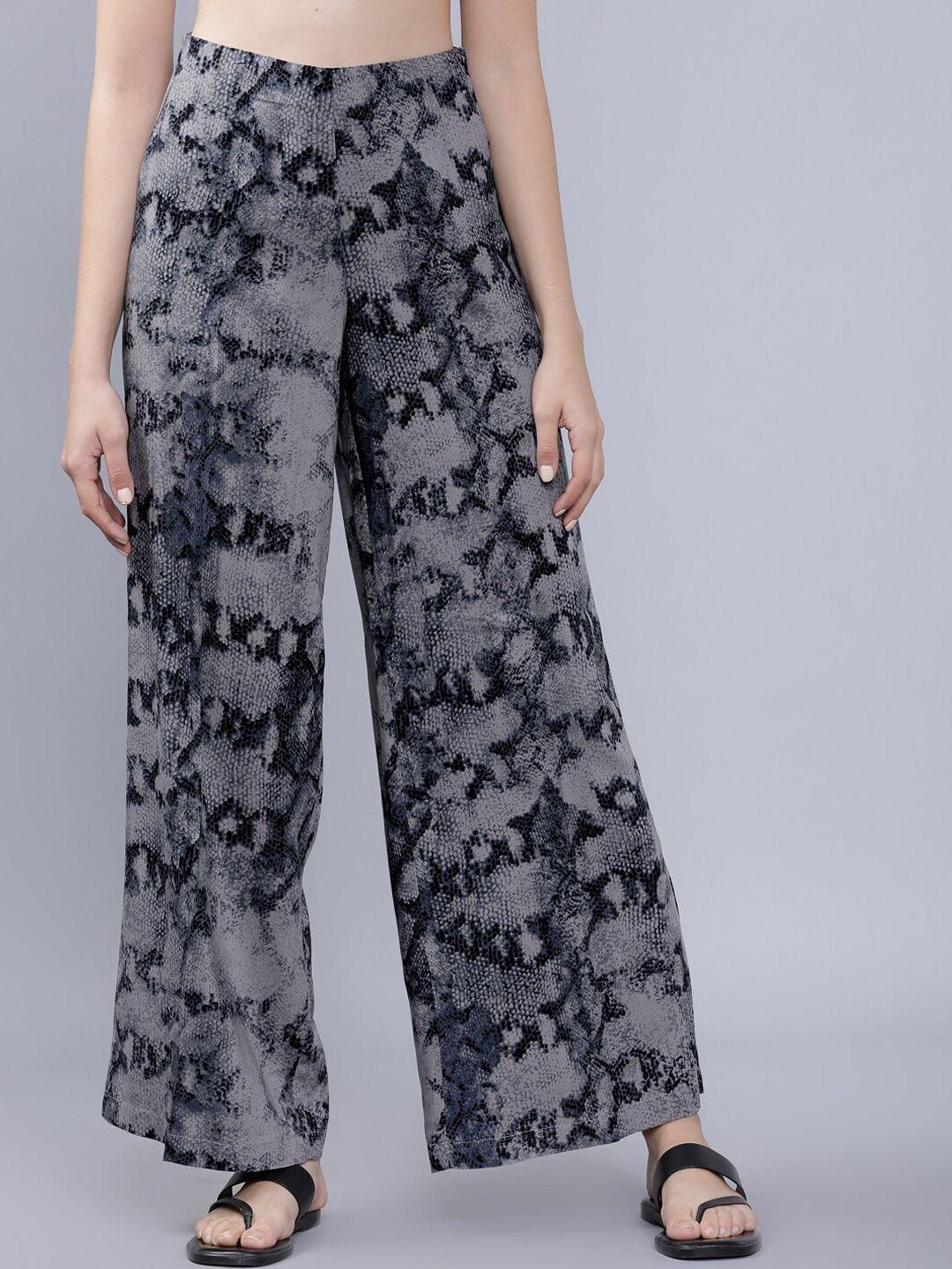 tokyo talkies women black & grey loose fit animal printed parallel trousers