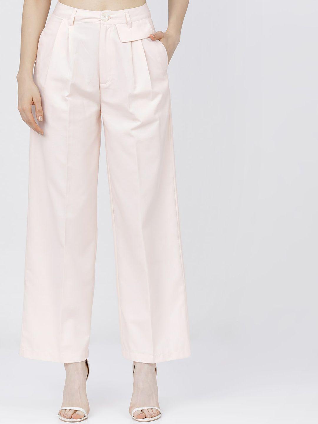 tokyo talkies women cream-coloured pleated parallel trousers