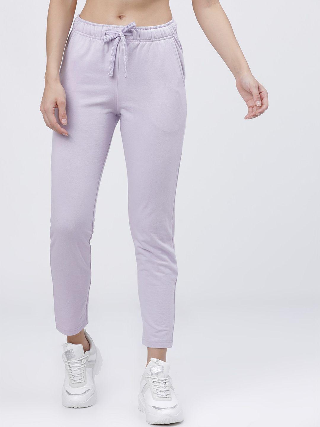 tokyo talkies women lavender-coloured solid slim-fit track pants