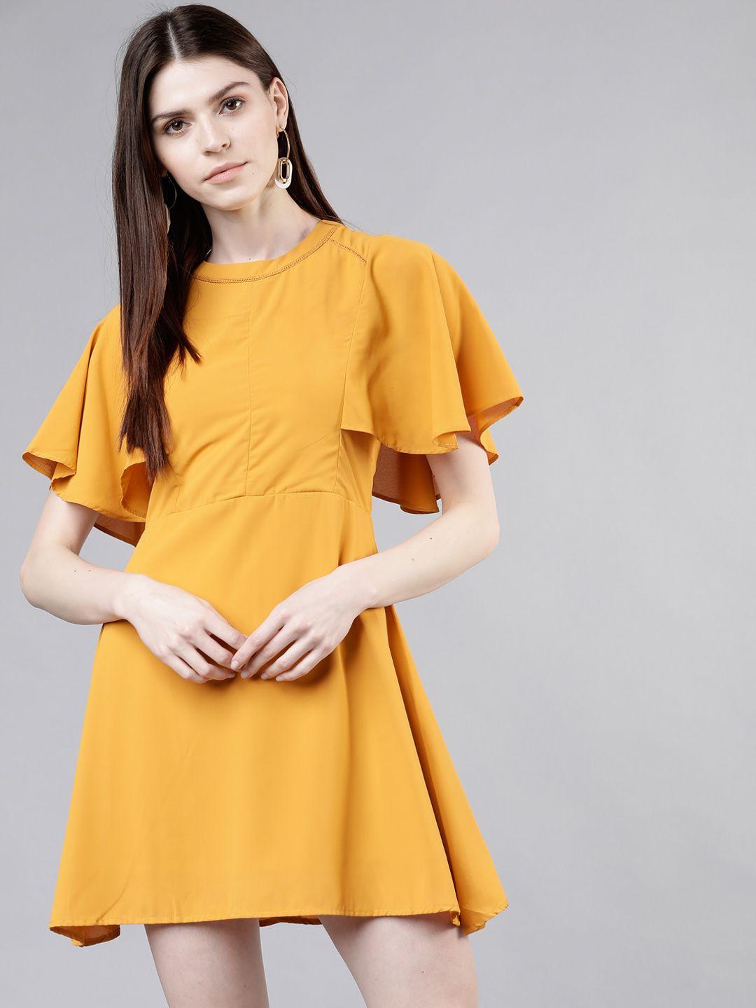 tokyo talkies women solid mustard yellow fit and flare dress
