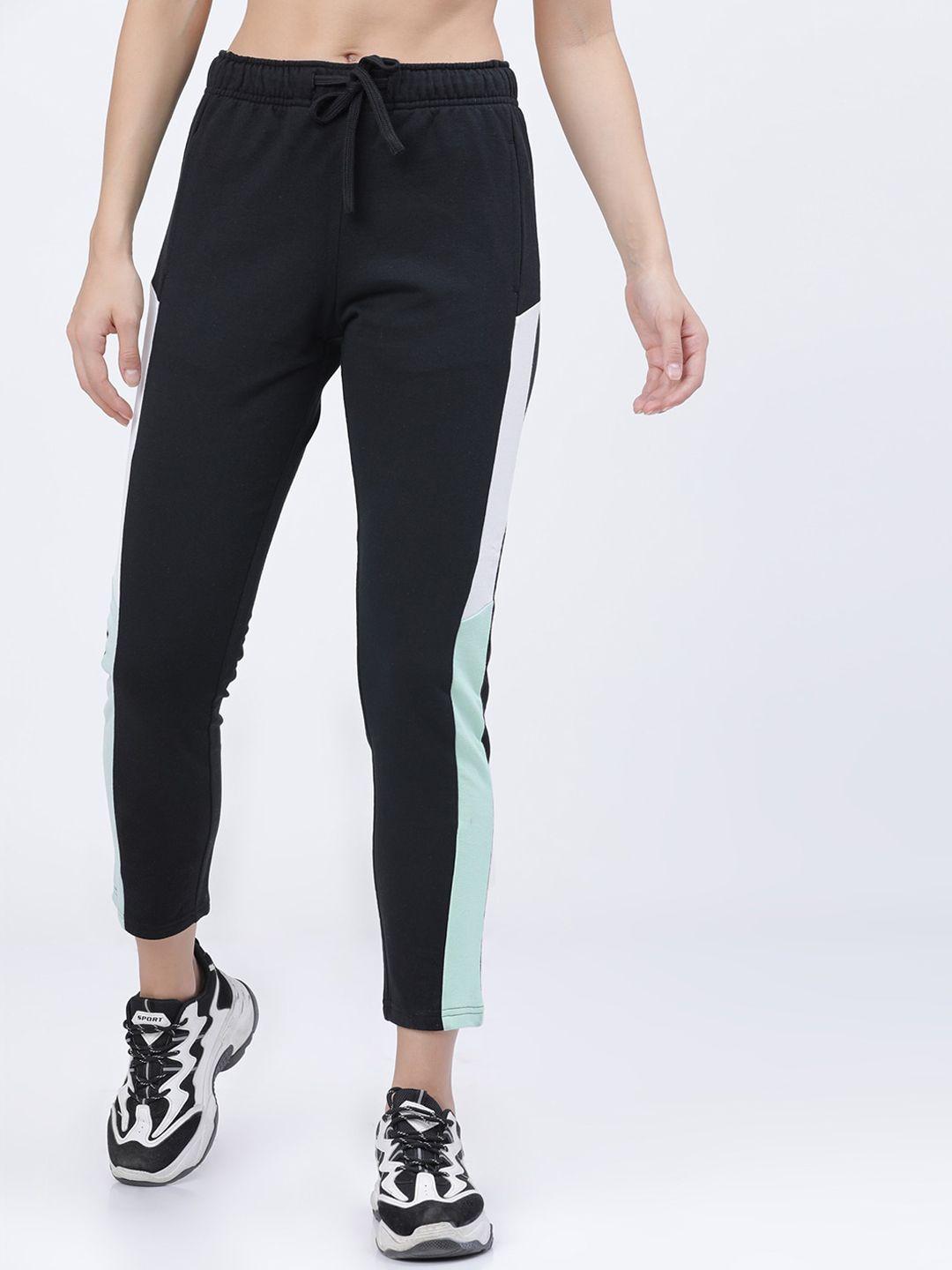 tokyo talkies women black solid slim-fit casual track pants