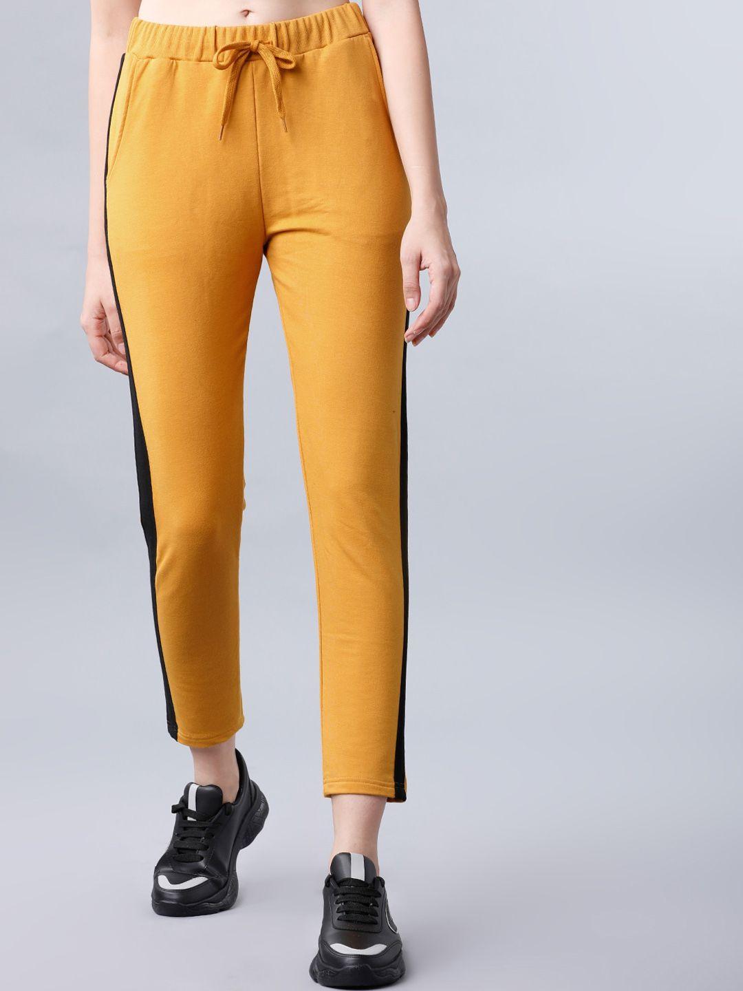 tokyo talkies women mustard yellow solid slim-fit cropped track pants