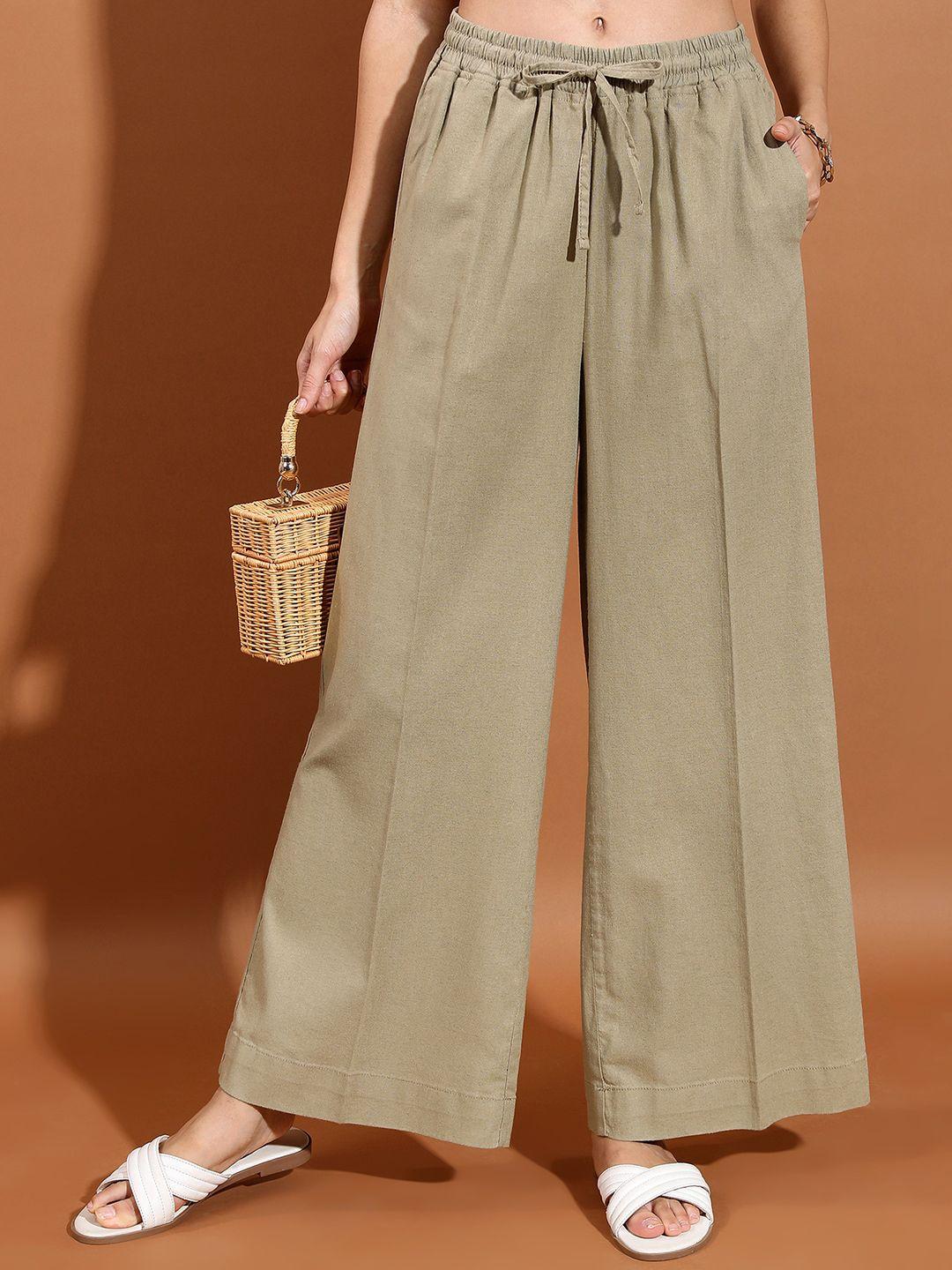 tokyo talkies women olive green mid rise cotton flared parallel trousers