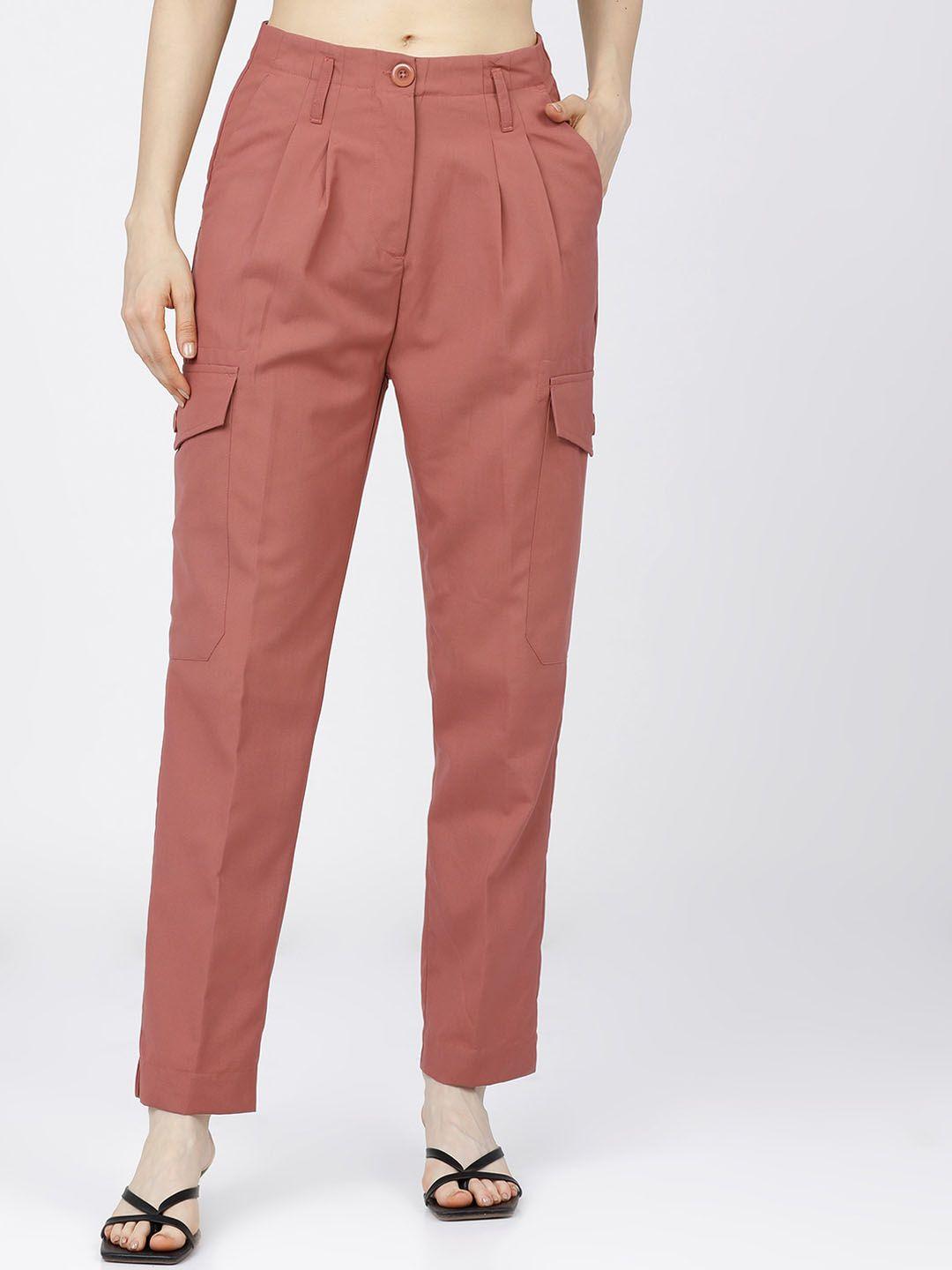 tokyo talkies women peach-coloured pleated trousers