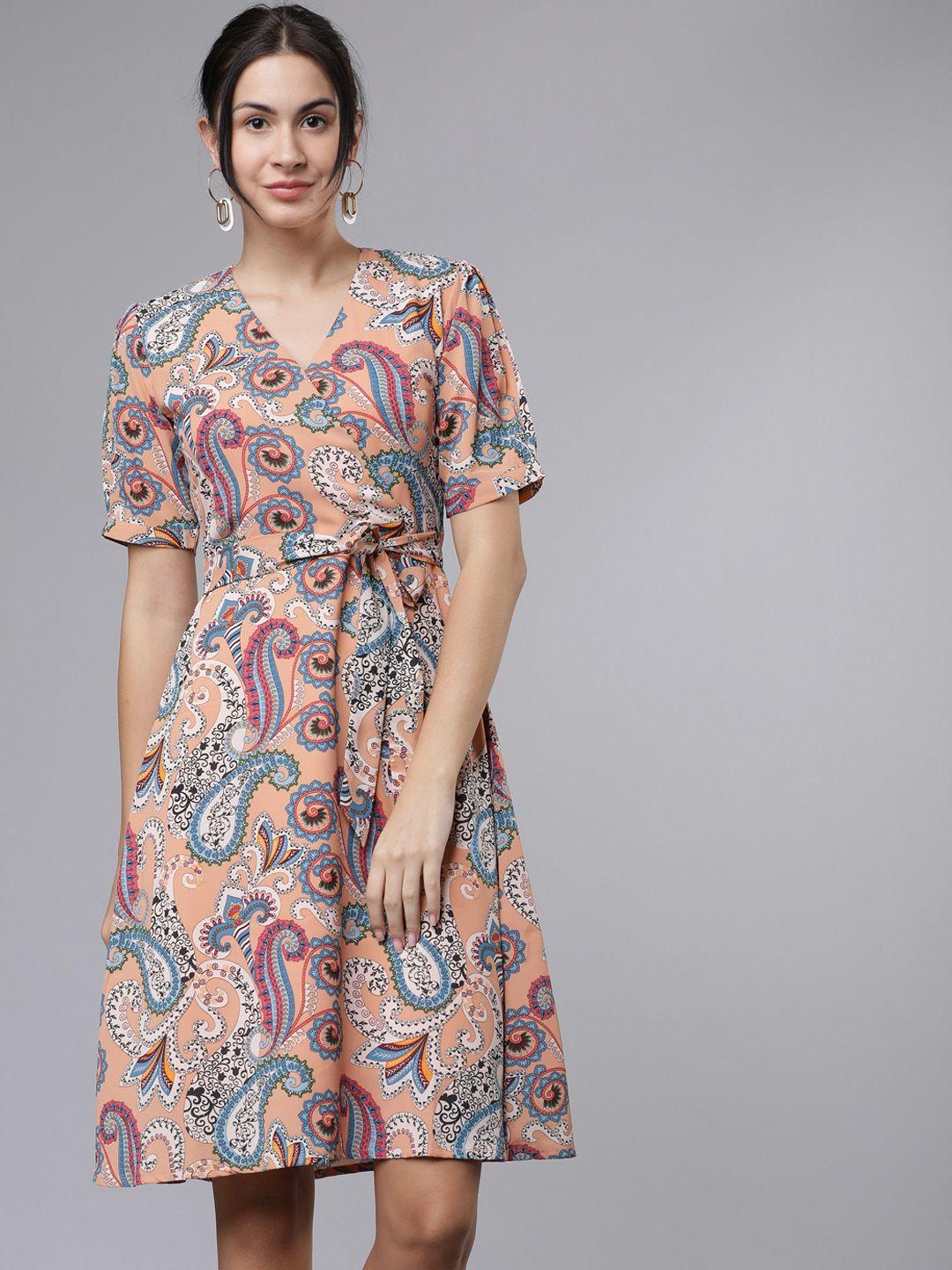 tokyo talkies women peach-coloured printed wrap dress