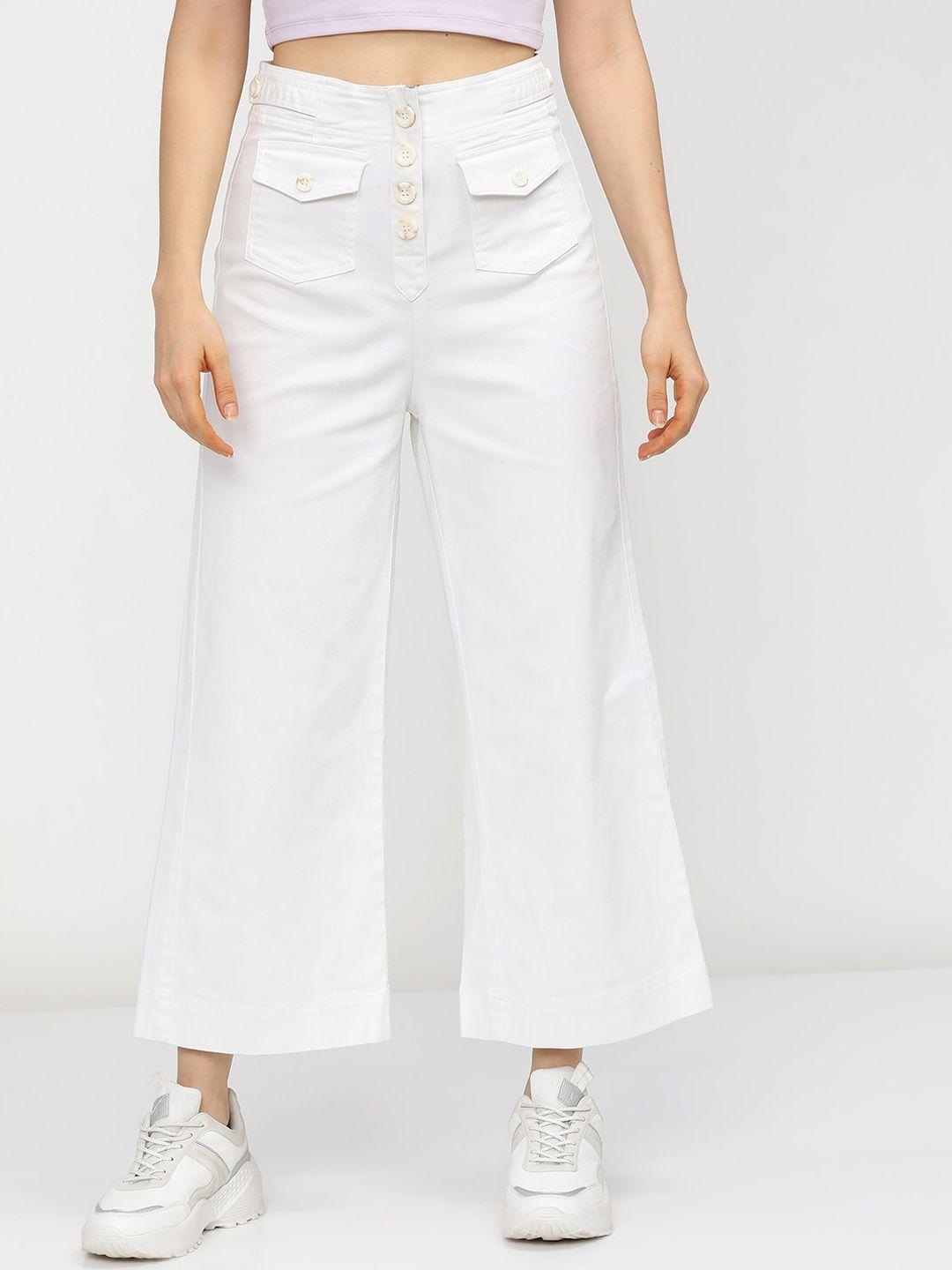 tokyo talkies women white flared trousers