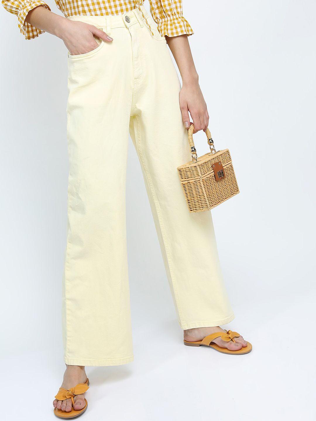 tokyo talkies women yellow flared jeans