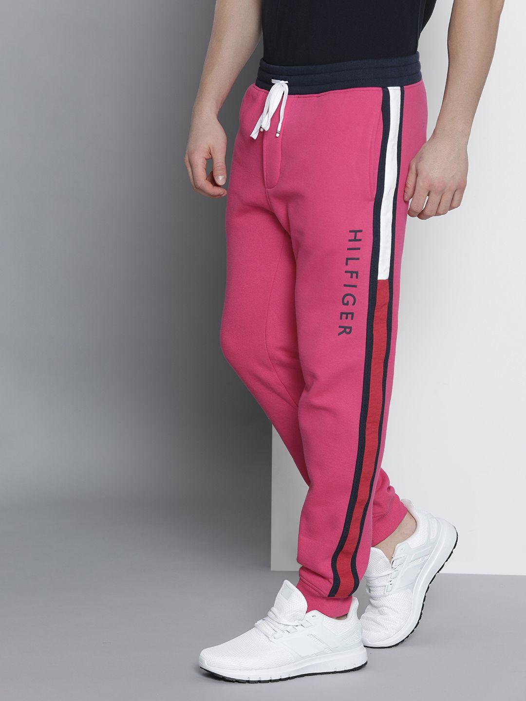 tommy hilfiger men fuchsia pink brand logo printed regular joggers with side stripes