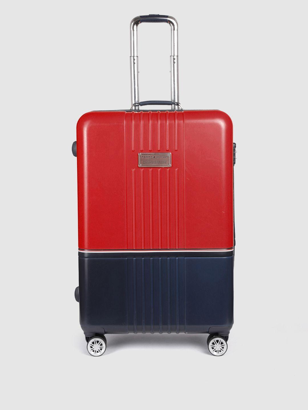 tommy hilfiger red & navy blue 360 degree rotation medium hard trolley bag