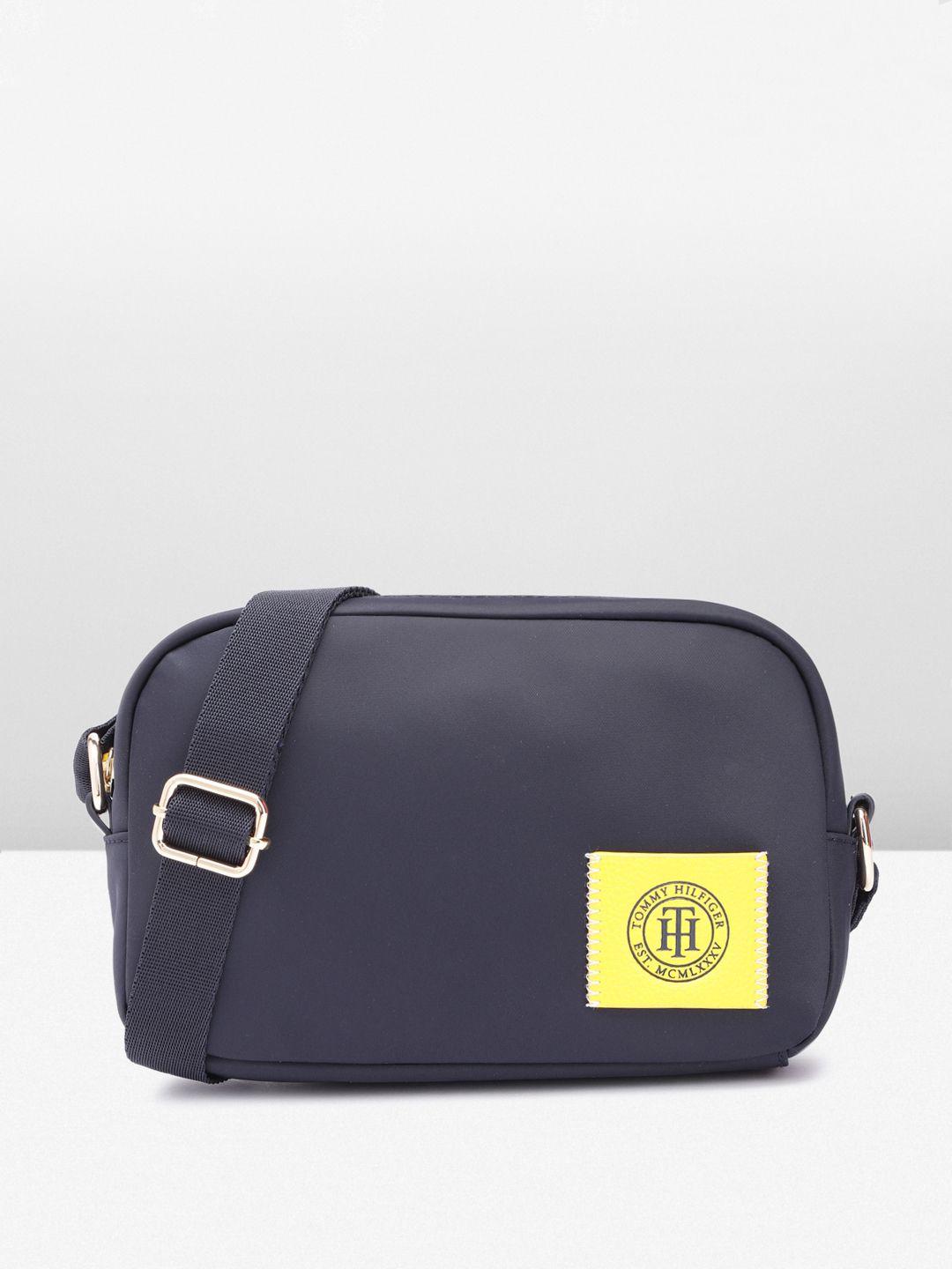 tommy hilfiger solid structured sling bag with brand logo applique detail