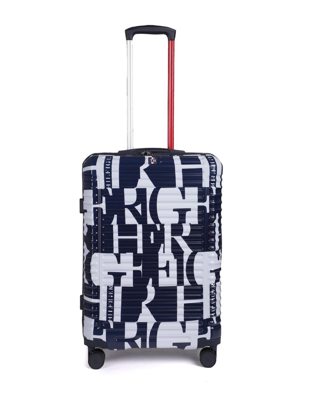 tommy hilfiger textured hard-sided 4 wheels 360-degree rotation medium trolley bag- 86 l