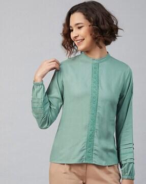 top with cuffed sleeves