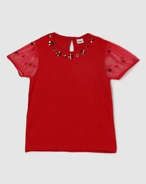 top with embellishments