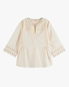 top with eyelet details