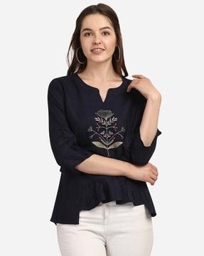 top with floral embroidery