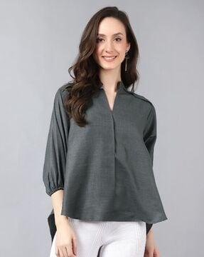 top with high-low hemline