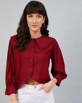 top with ruffle accent