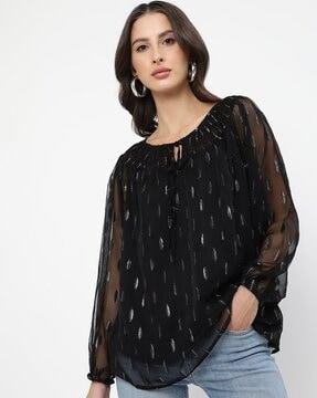 top with woven motifs