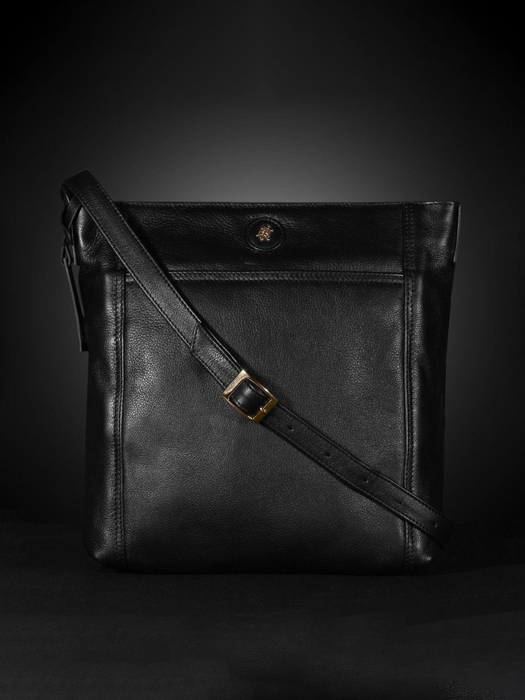 tortoise black leather structured sling bag with cut work