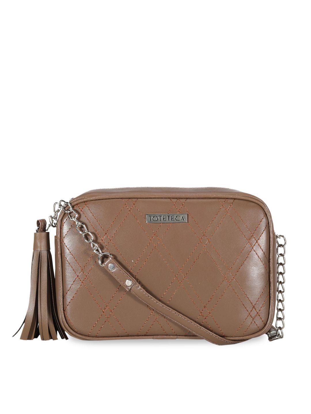 toteteca brown textured pu structured sling bag with tasselled