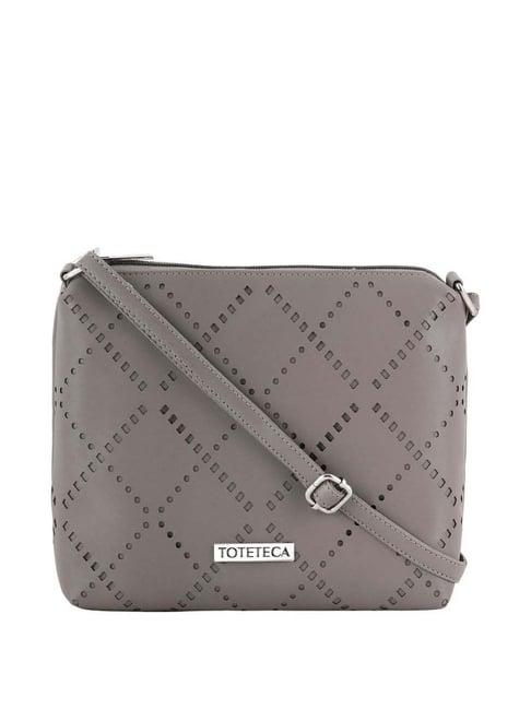 toteteca grey cut work medium sling handbag