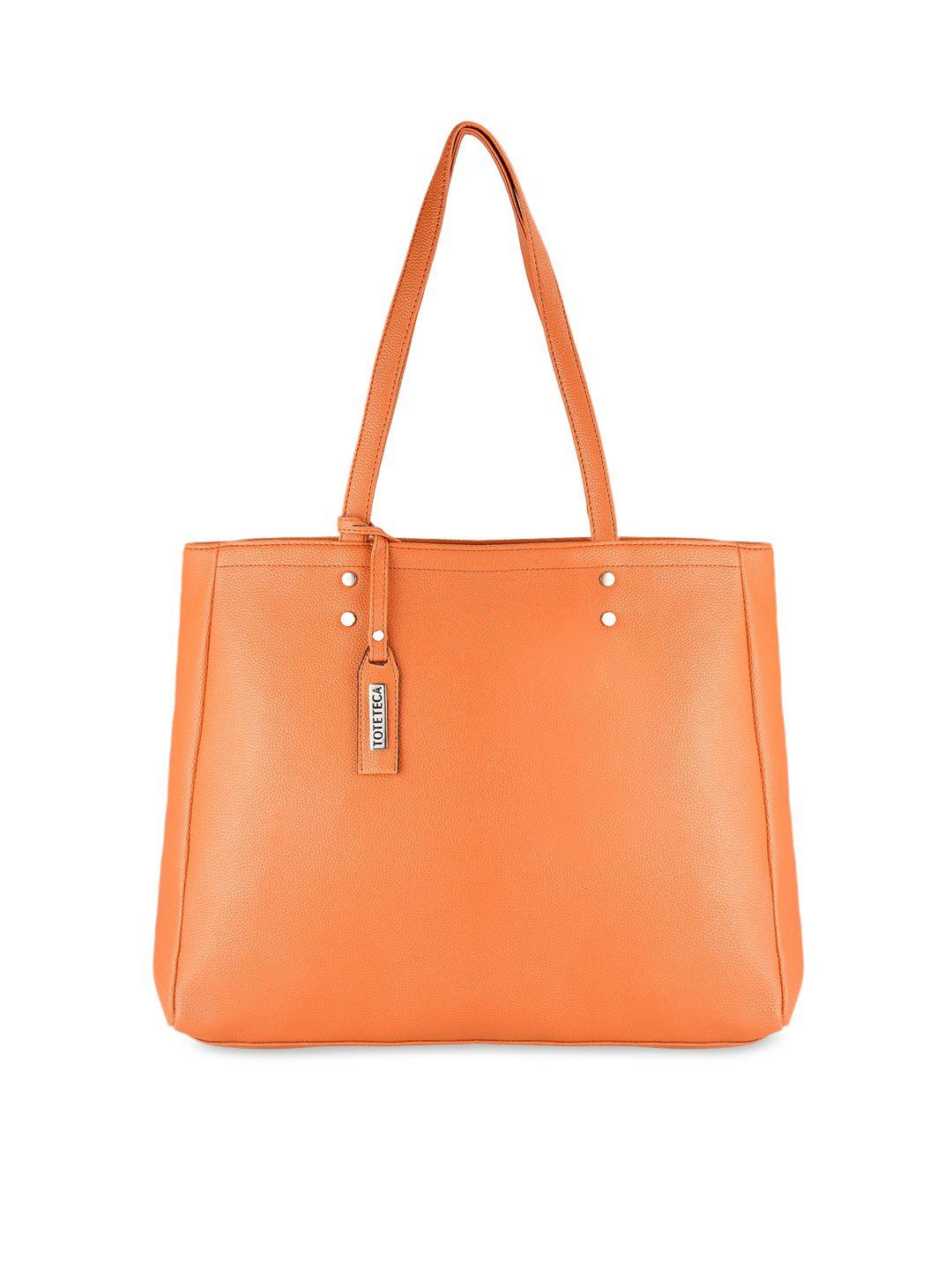 toteteca orange pu structured shoulder bag with tasselled