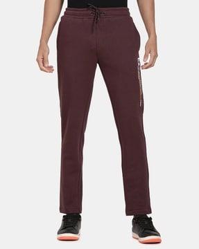 track pants with welt pockets