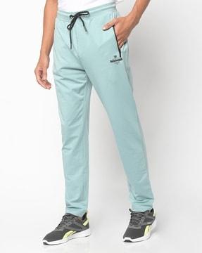 track pants with zipper pockets