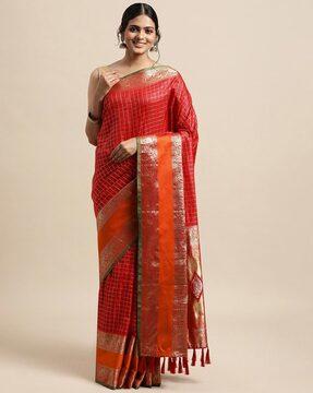 traditional checked saree with tassels