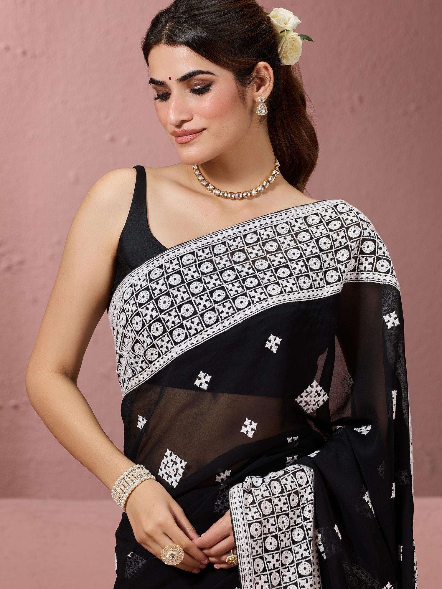 traditional contrast heavy thread work with tassel georgette black saree & unstitched blouse