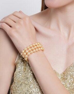 traditional rose gold pearl beaded bracelet
