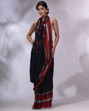 traditional saree with woven motifs