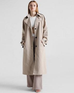 trench coat with button closure