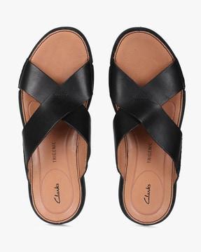 trisand flip-flops with criss-cross straps