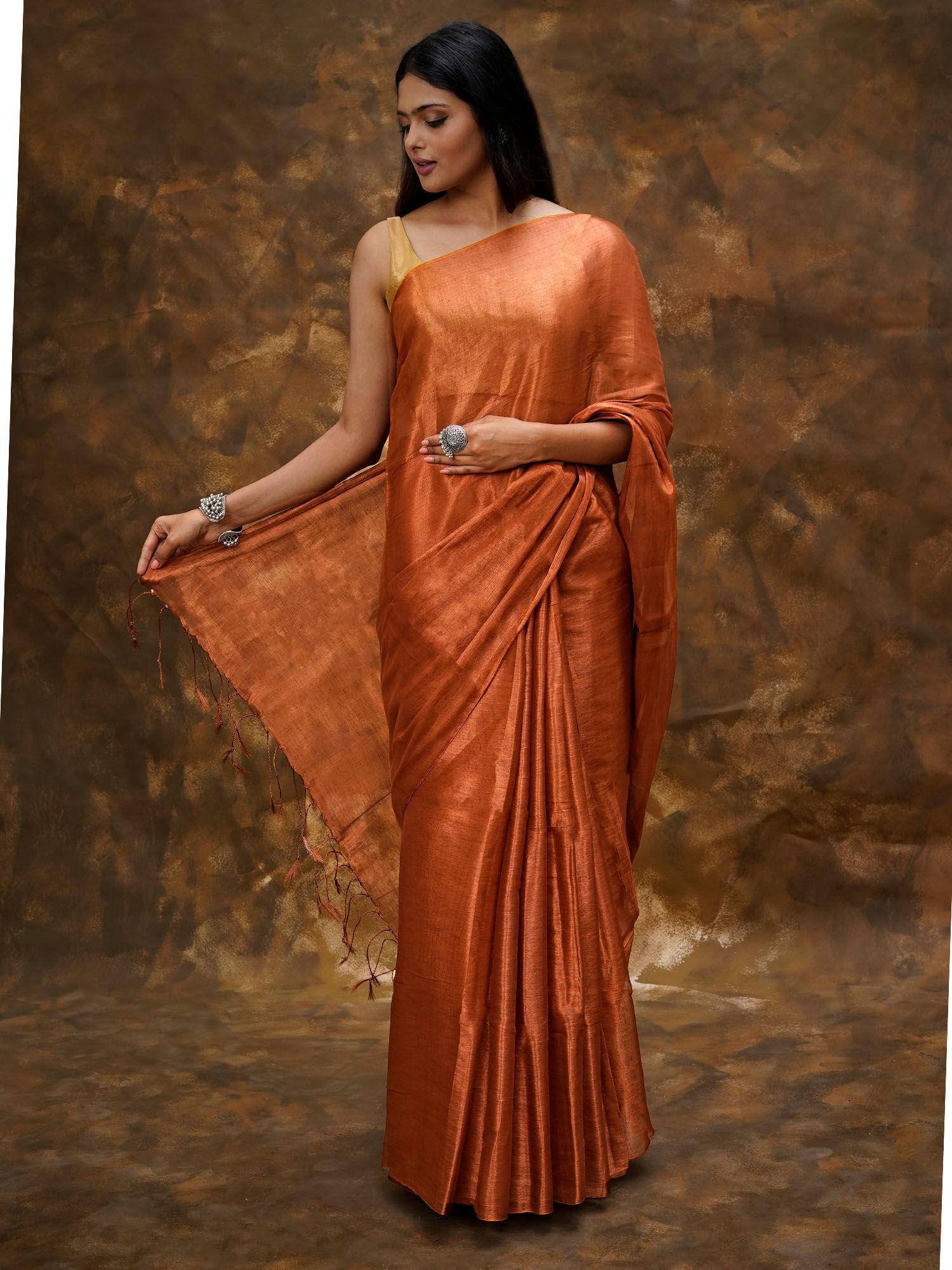 trishika copper brown tissue saree with unstitched blouse