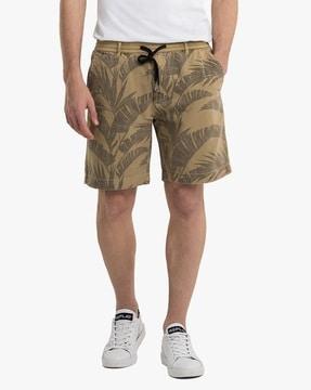 tropical print slim fit bermuda shorts