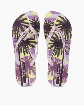 tropical print thong-strap flip-flops