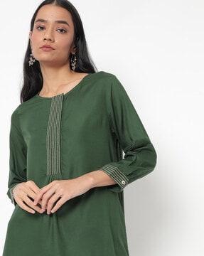 tunic with concealed placket