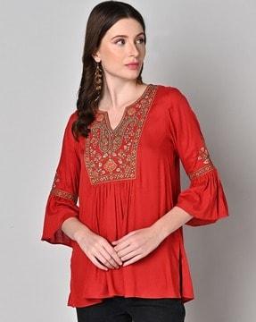 tunic with embroidered yoke