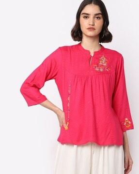 tunic with floral embroidery