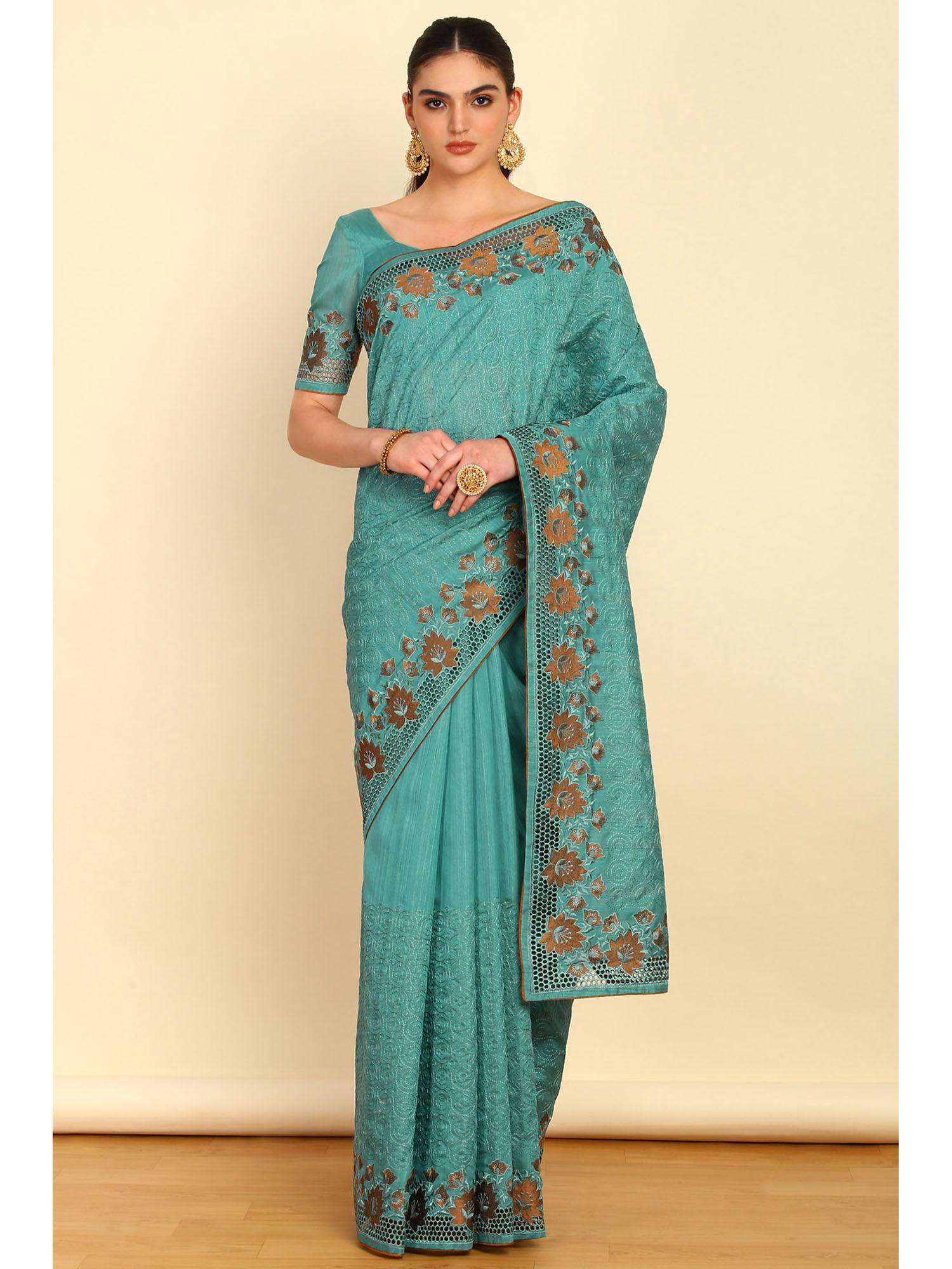 turquoise blue floral embroidered tussar saree with cutwork with unstitched blouse