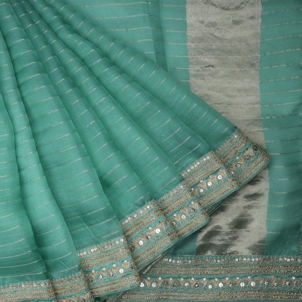 turquoise blue organza saree with embroidery