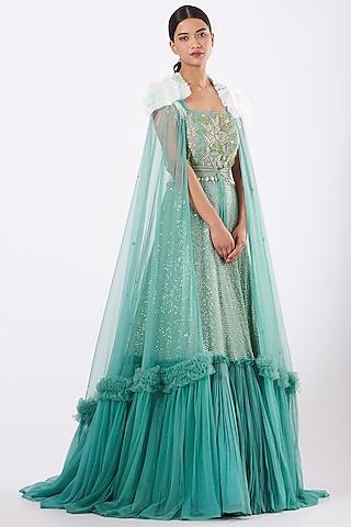 turquoise embroidered gown with cape