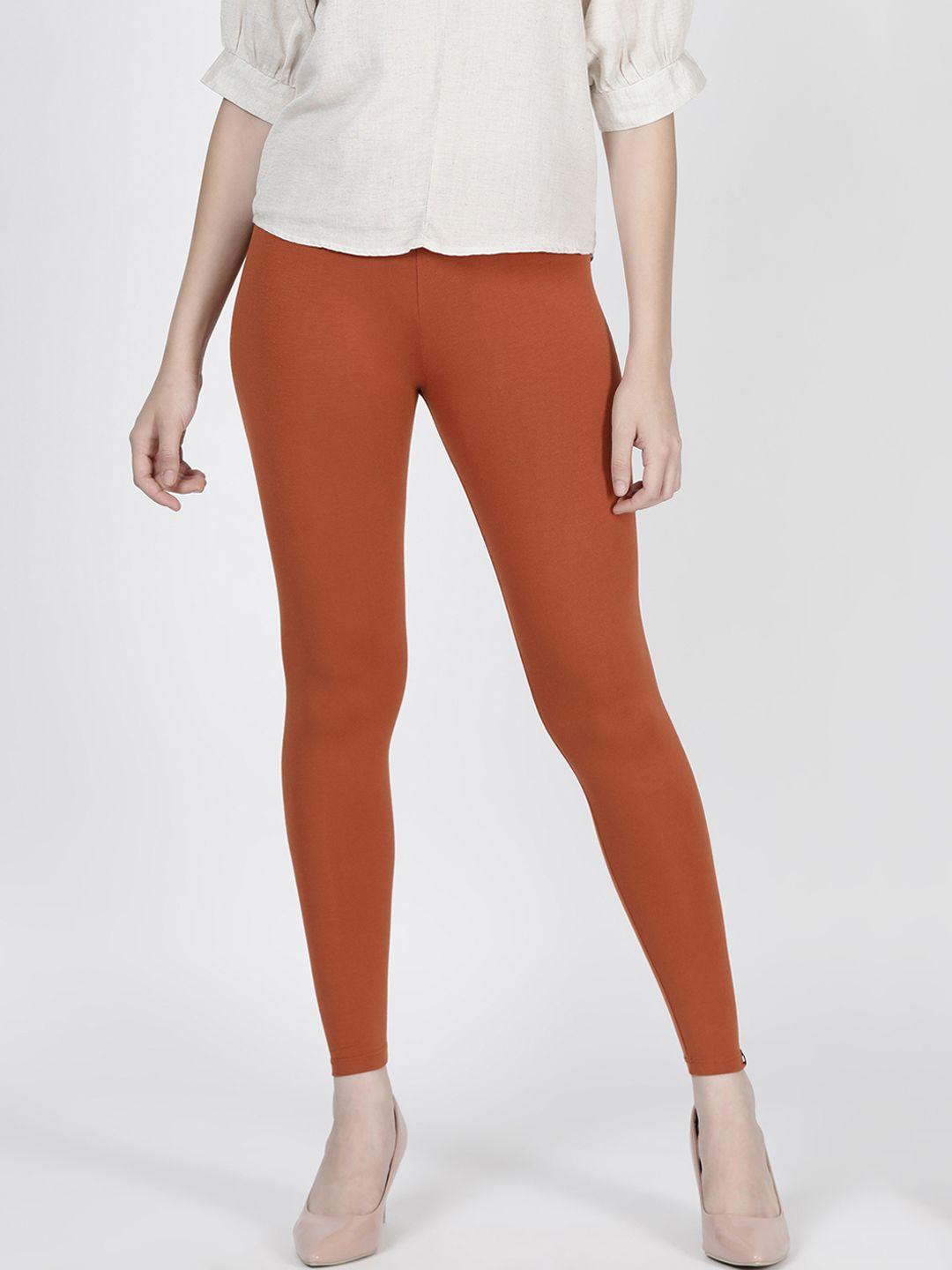 twin birds women orange solid claypot ankle-length leggings