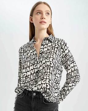 typographic print shirt with curved hem