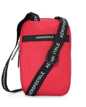 typographic cross body bag with adjustable strap